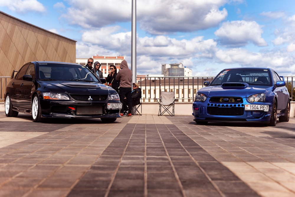 a couple of cars parked next to each other