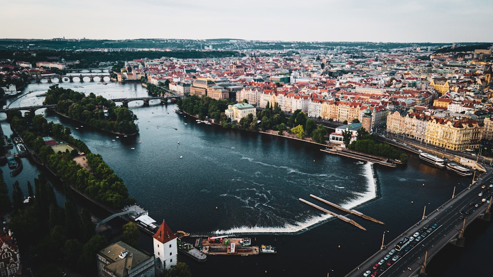 a river running through a city next to a bridge