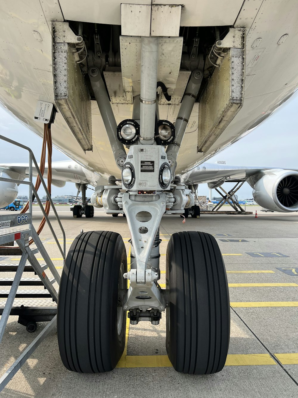 a large jetliner sitting on top of an airport tarmac