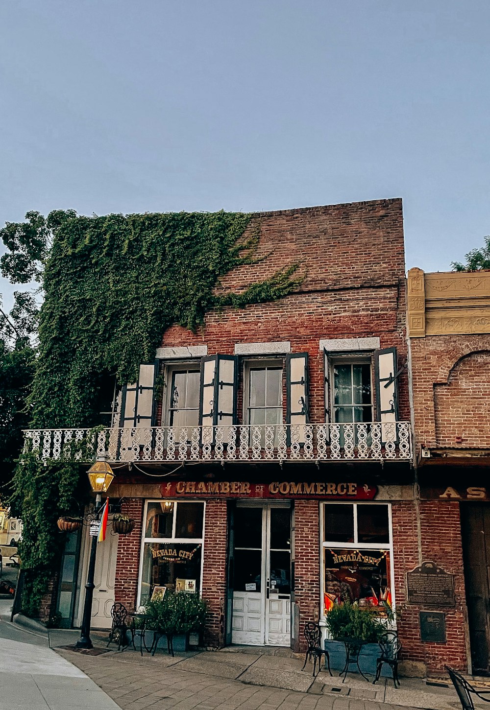 an old brick building with a balcony and balconies