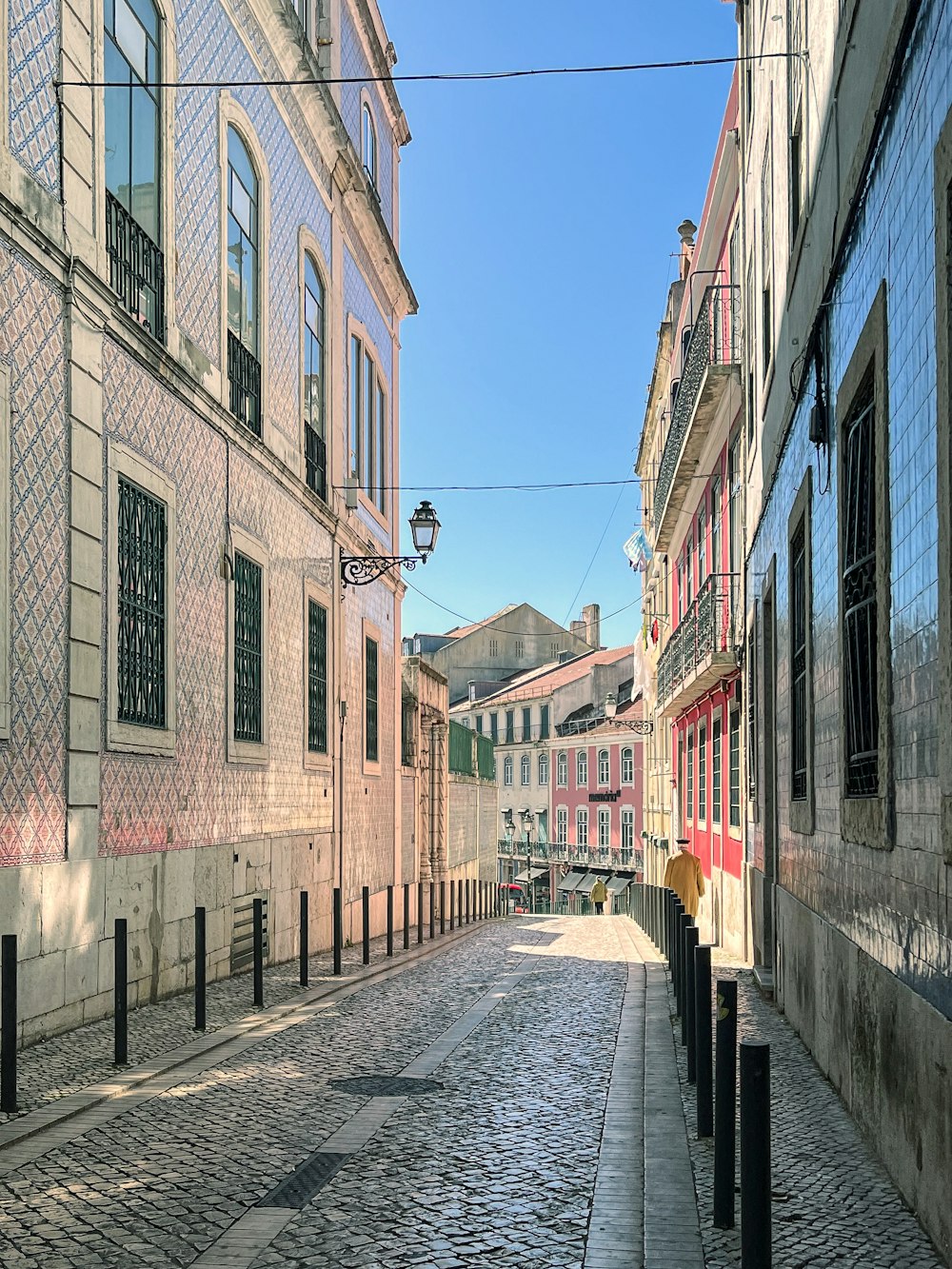 a cobblestone street in a european city