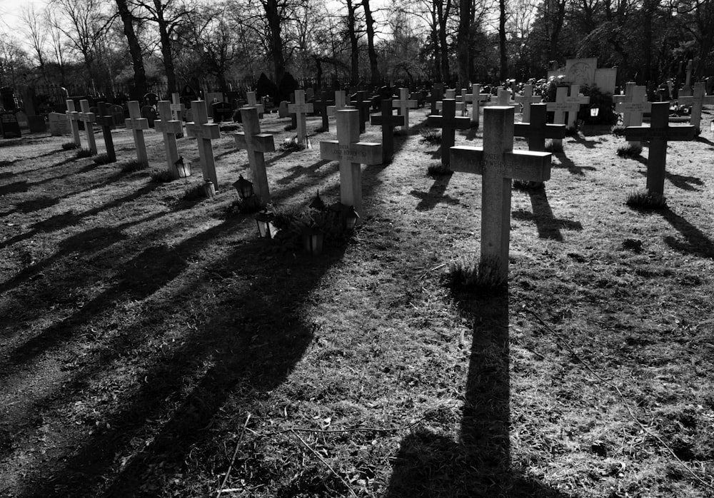 a black and white photo of a cemetery