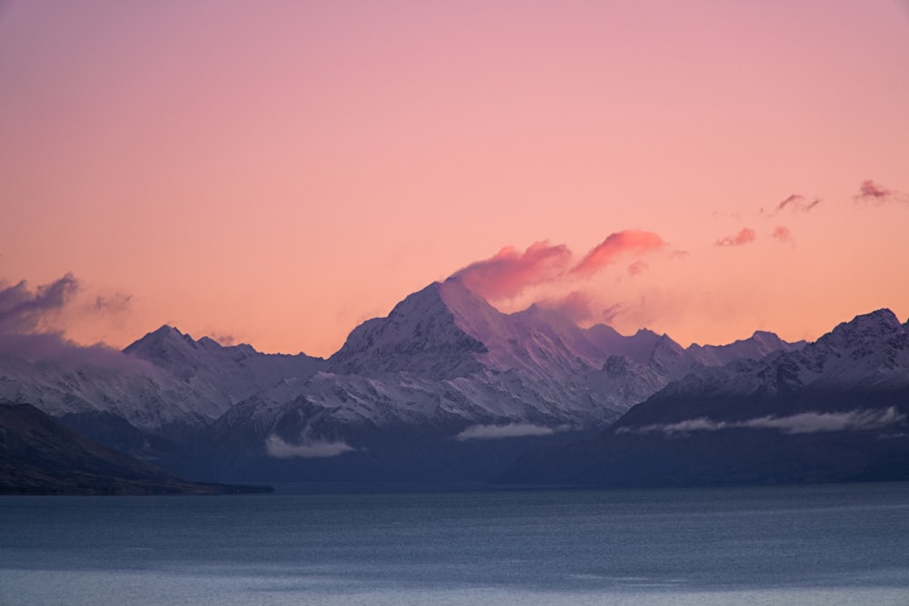 a view of a mountain range at sunset