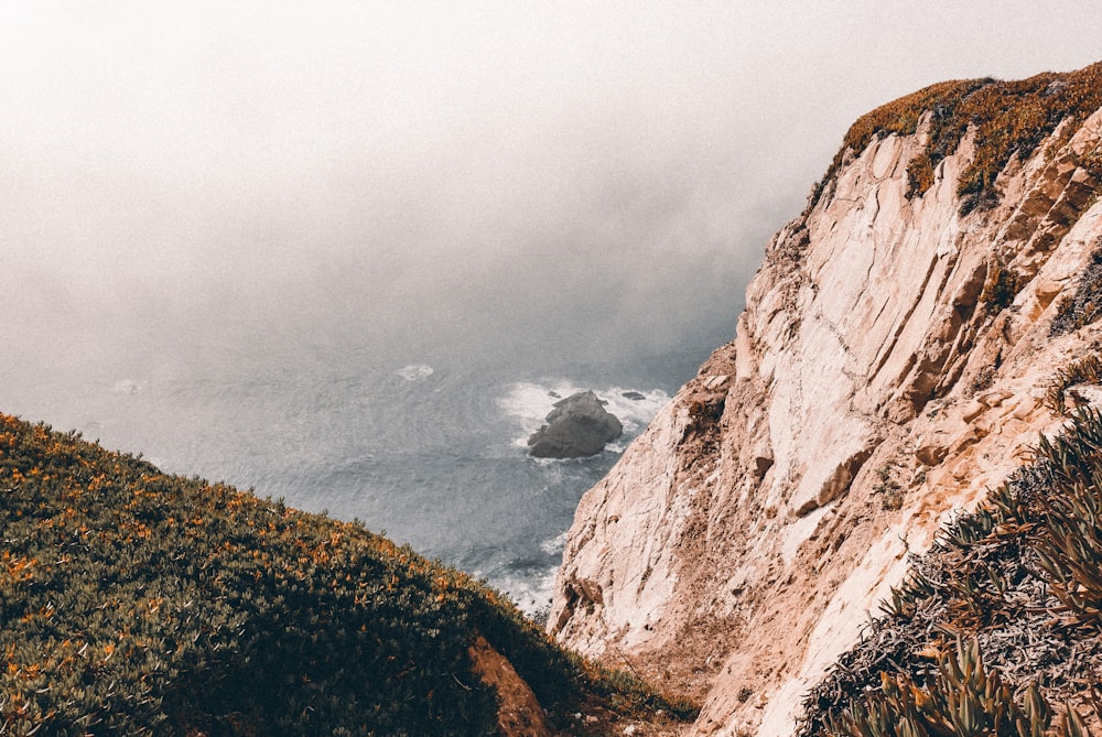 a view of the ocean from the top of a mountain