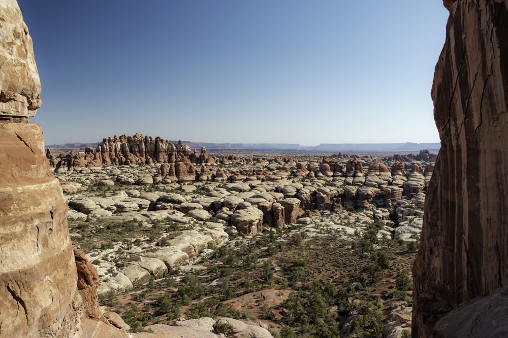 a view of a rocky landscape from a cliff