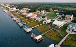 a large body of water surrounded by lots of houses