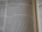 A close-up photo of an open book showing a passage that discusses the topic of freeing slaves. The text is formatted in columns with a heading 'Freedom for slaves' at the top, typical of a religious or historical text.
