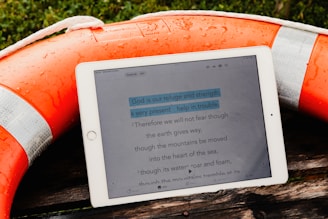 a tablet sitting on top of a wooden table