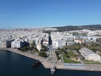 a large body of water next to a city