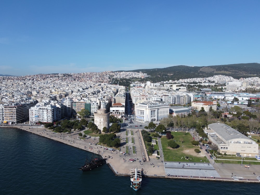 a large body of water next to a city