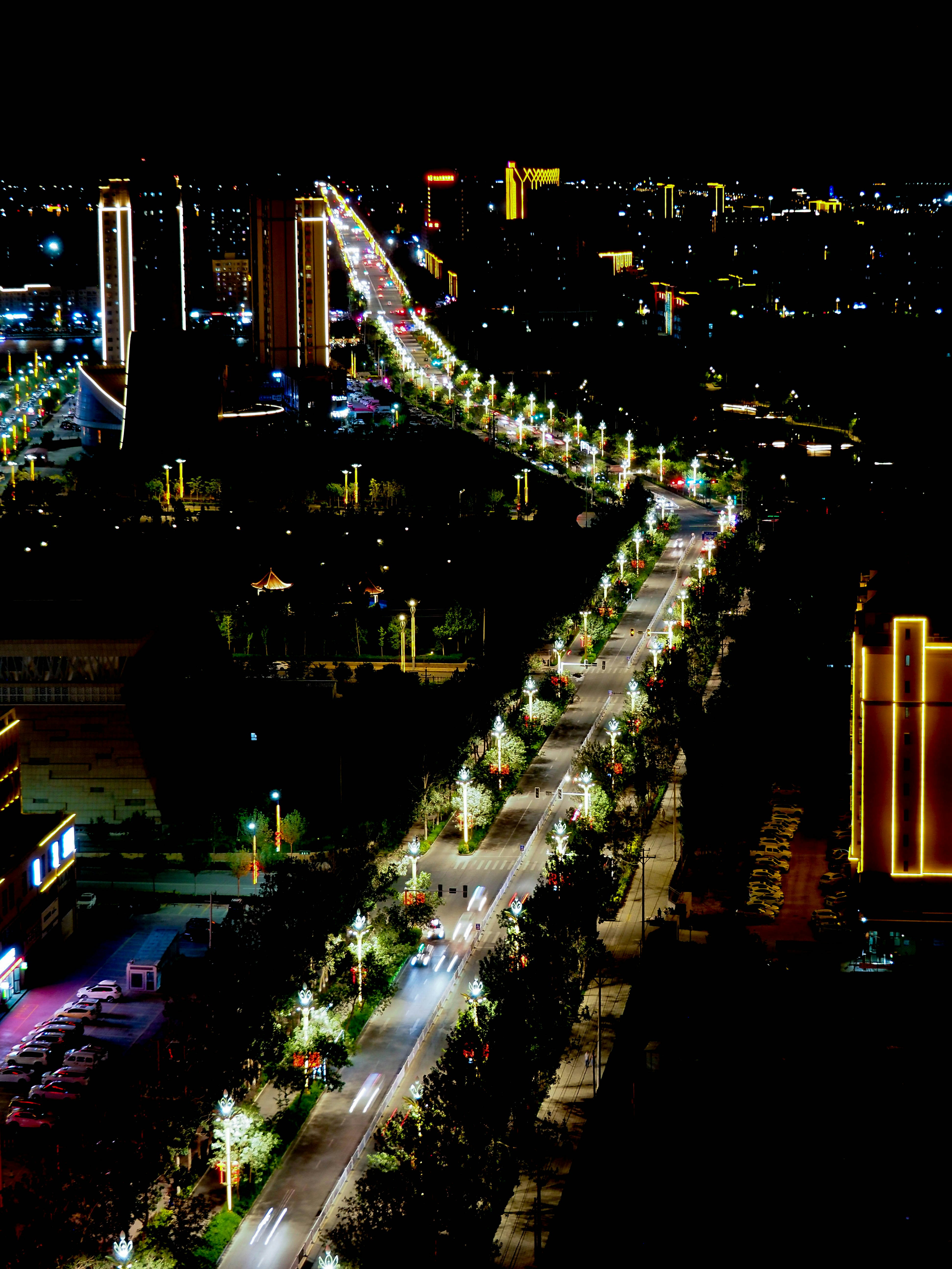 a night time view of a city street