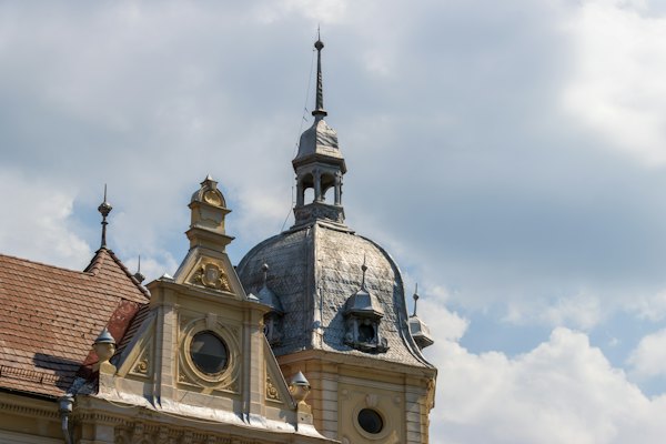 A large building with a clock on the top of it — Brasov, Romania