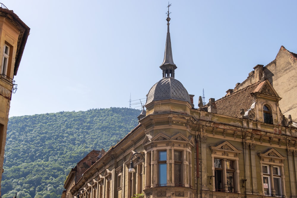 an old building with a steeple on top of it