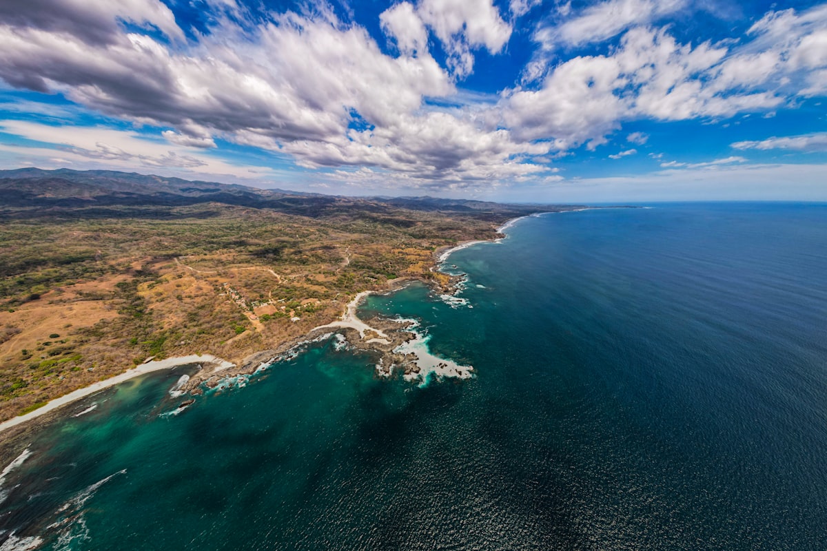 Costa Rica January — aerial view of the Pacific coastline in Guanacaste with turquoise water and green hills