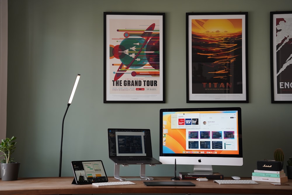 a desktop computer sitting on top of a wooden desk