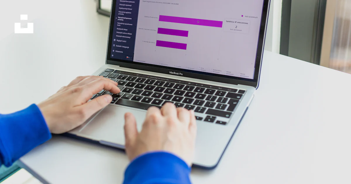 Unsplash Main Using Computer A person using a laptop computer on a desk photo – Free Macbook Image ...