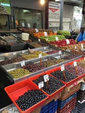 Fresh local produce displayed at a bustling Niolu market stall.