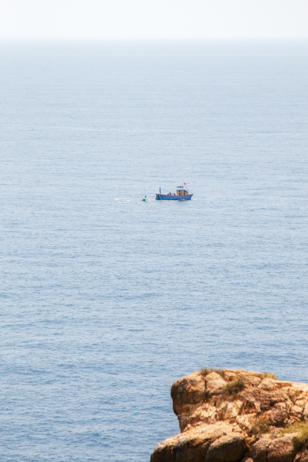 a boat is out in the open water