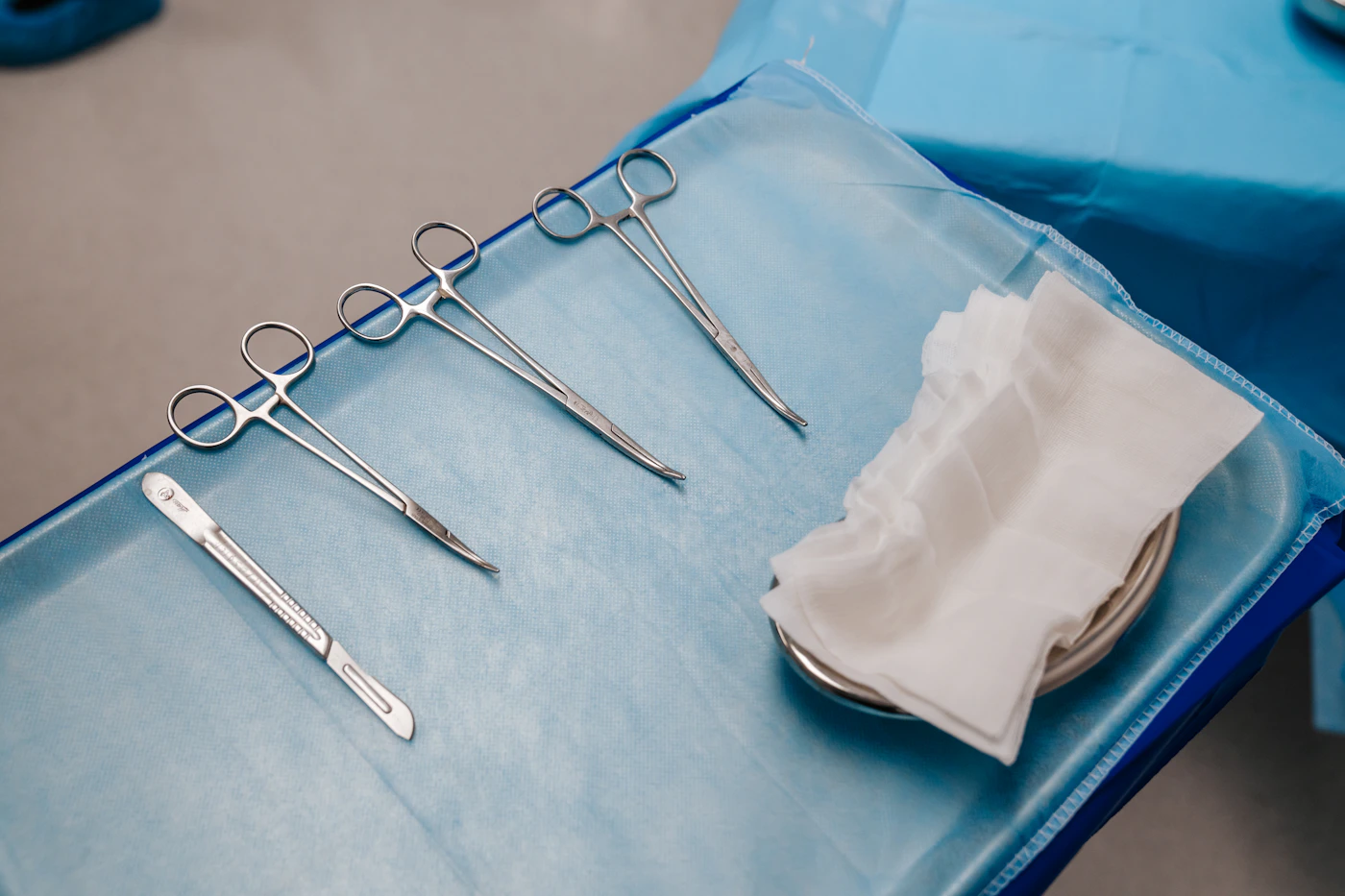 A tray with surgical instruments arranged for sterilization