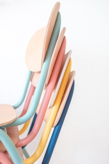 A diverse range of accent chairs in various colors.