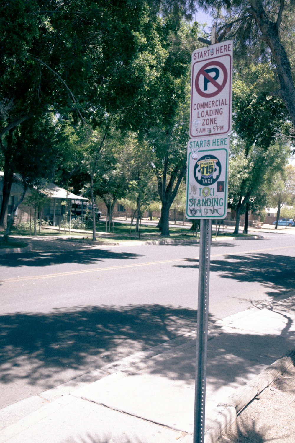 a no parking sign on the side of the road