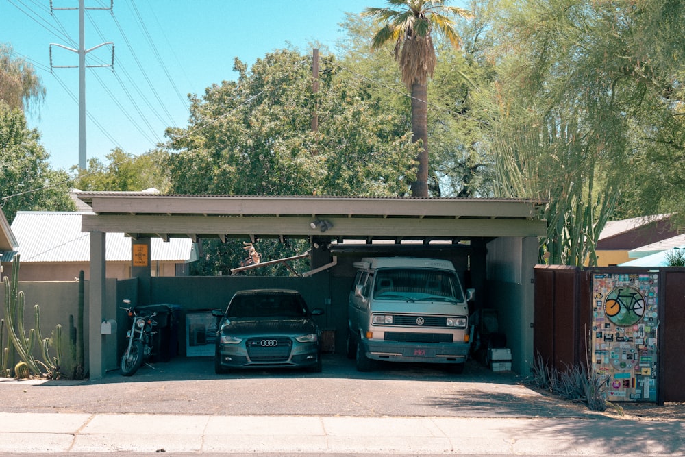 a couple of trucks parked in a garage