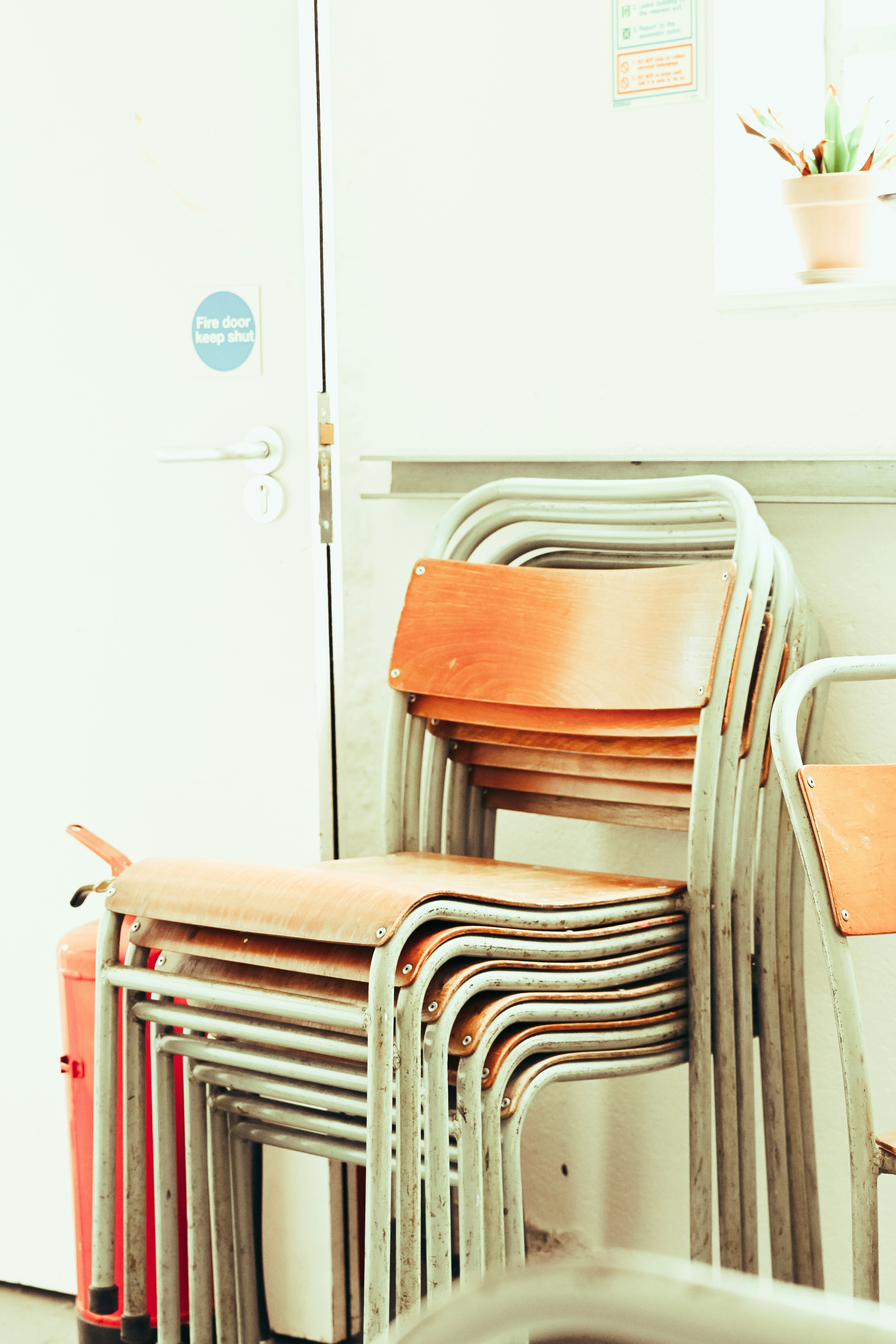 a stack of chairs sitting next to each other