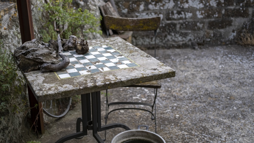 a table with a chess board on top of it