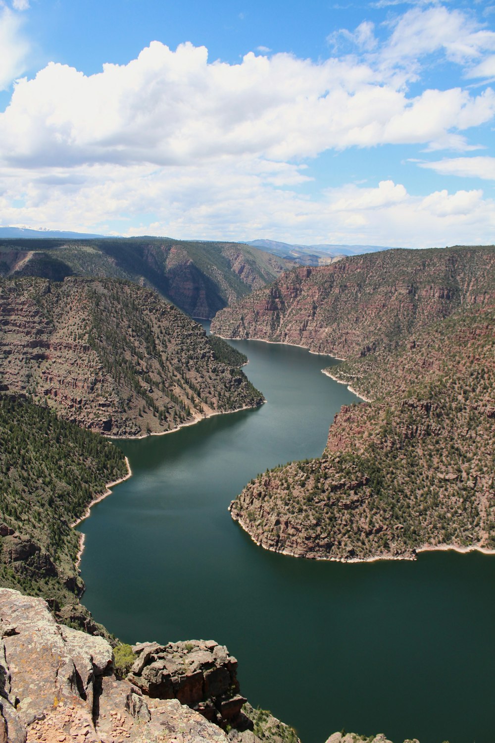 a large body of water surrounded by mountains