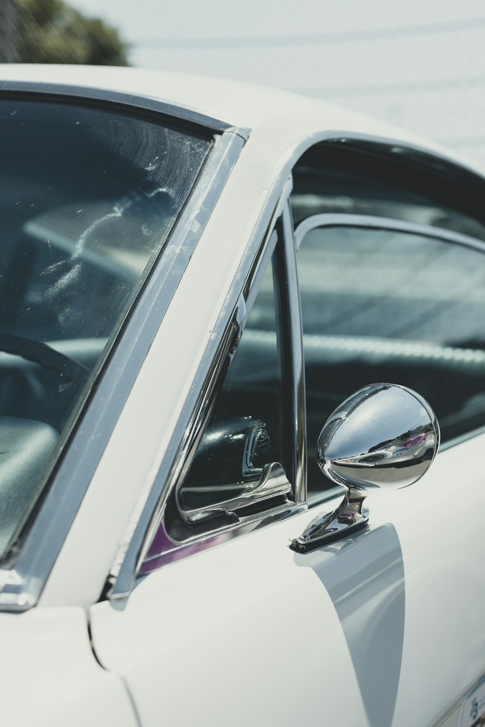 a close up of a car's side mirror