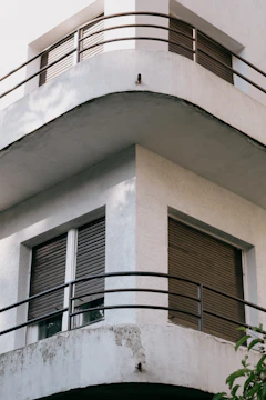 Exterior corner of a residential building showcasing durable WPC cladding resisting harsh weather.