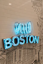 A welcoming storefront of Boston Appliance Co with clear signage and a sunny sky.