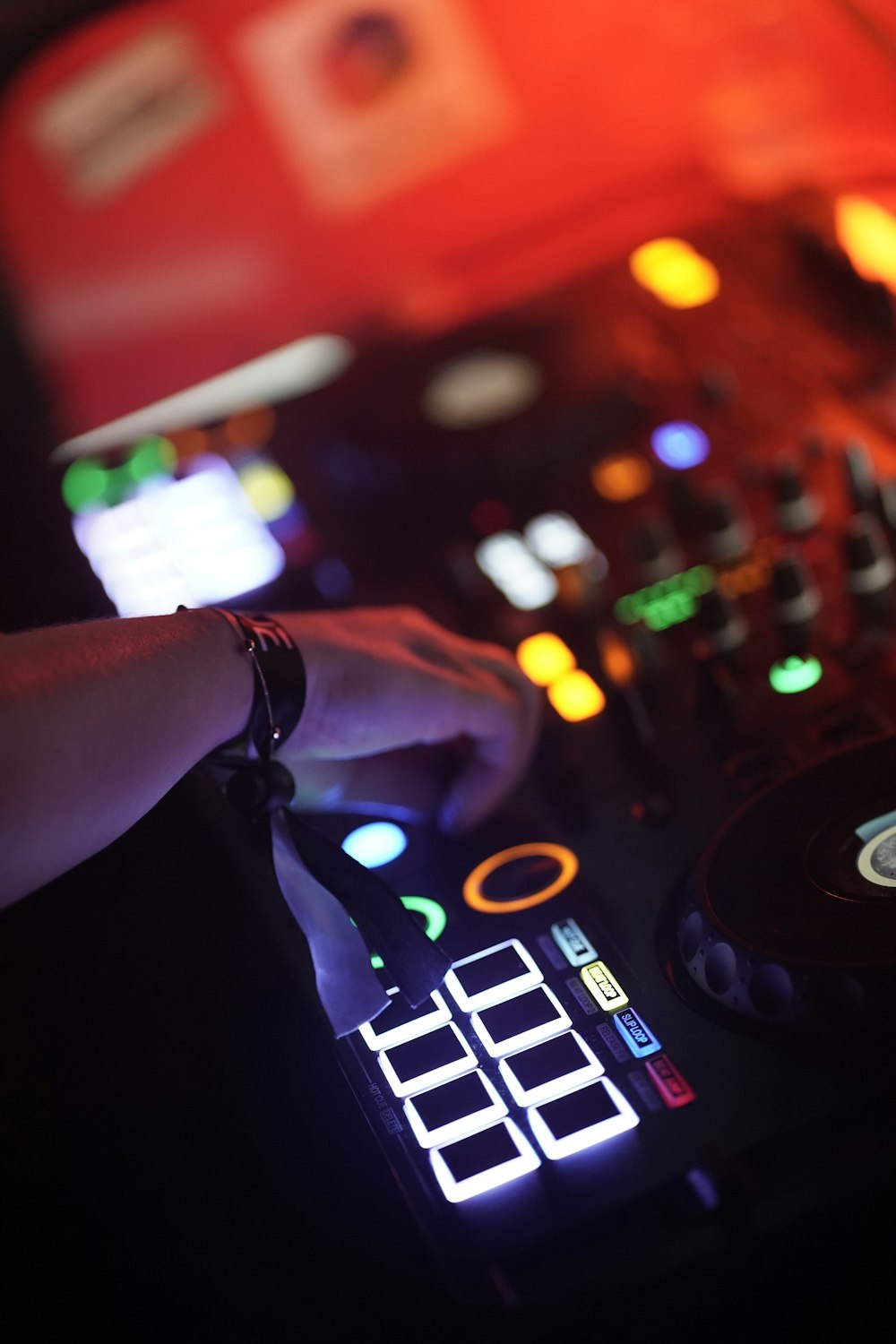 a person using a dj controller at a party