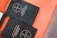 Two black books titled 'The Book of Alternative Services of The Anglican Church of Canada' are placed on an orange surface. The cover features a simple cross emblem.