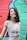 a woman standing in front of a colorful wall