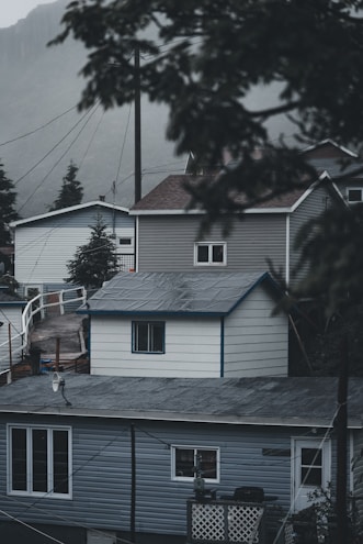 a view of a house from the top of a hill