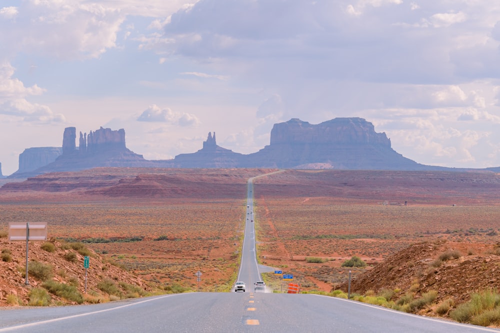 a long road in the middle of the desert