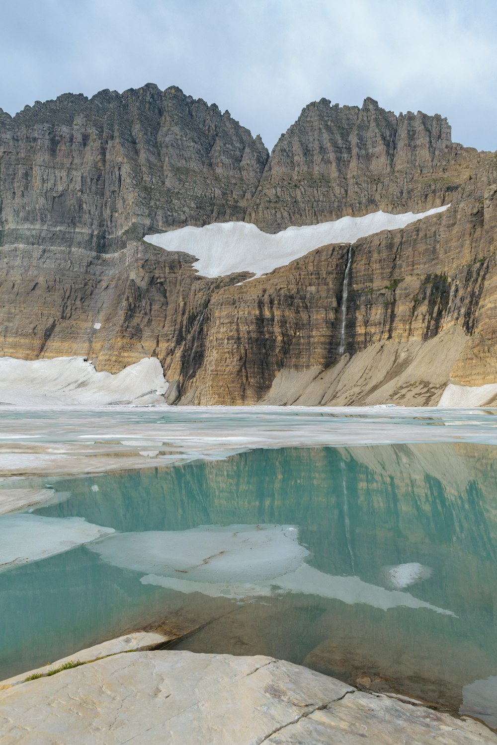 a large body of water surrounded by mountains