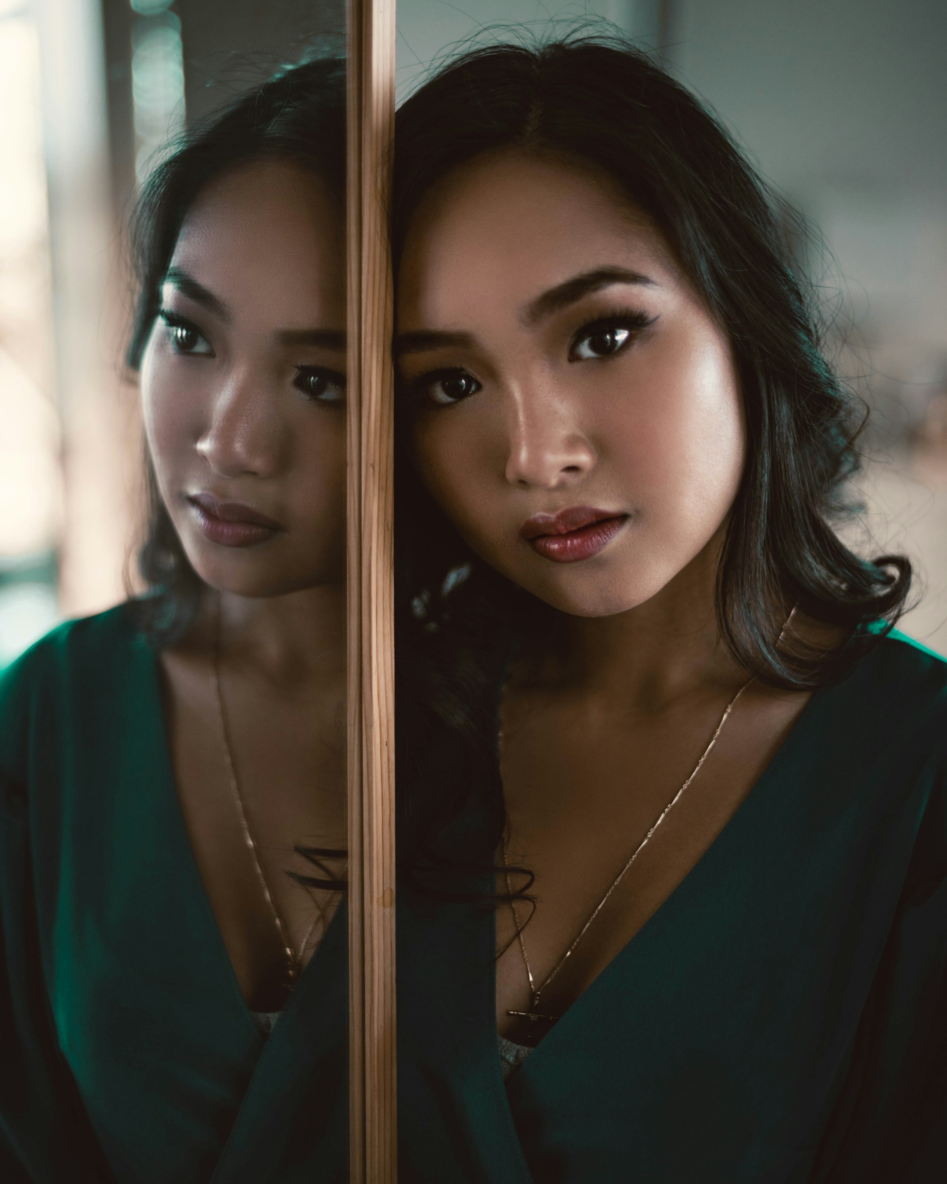 two beautiful young women standing next to each other