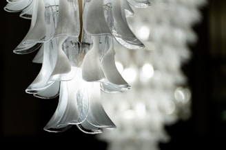 A close-up of a beautifully designed chandelier with intricate details.