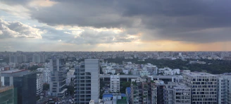 Panoramic view of a sophisticated urban skyline with a cinematic atmosphere.