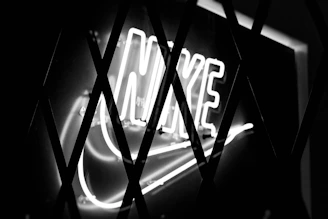 Abstract silhouettes of male athletes merging with brand logos in a clean grid layout.