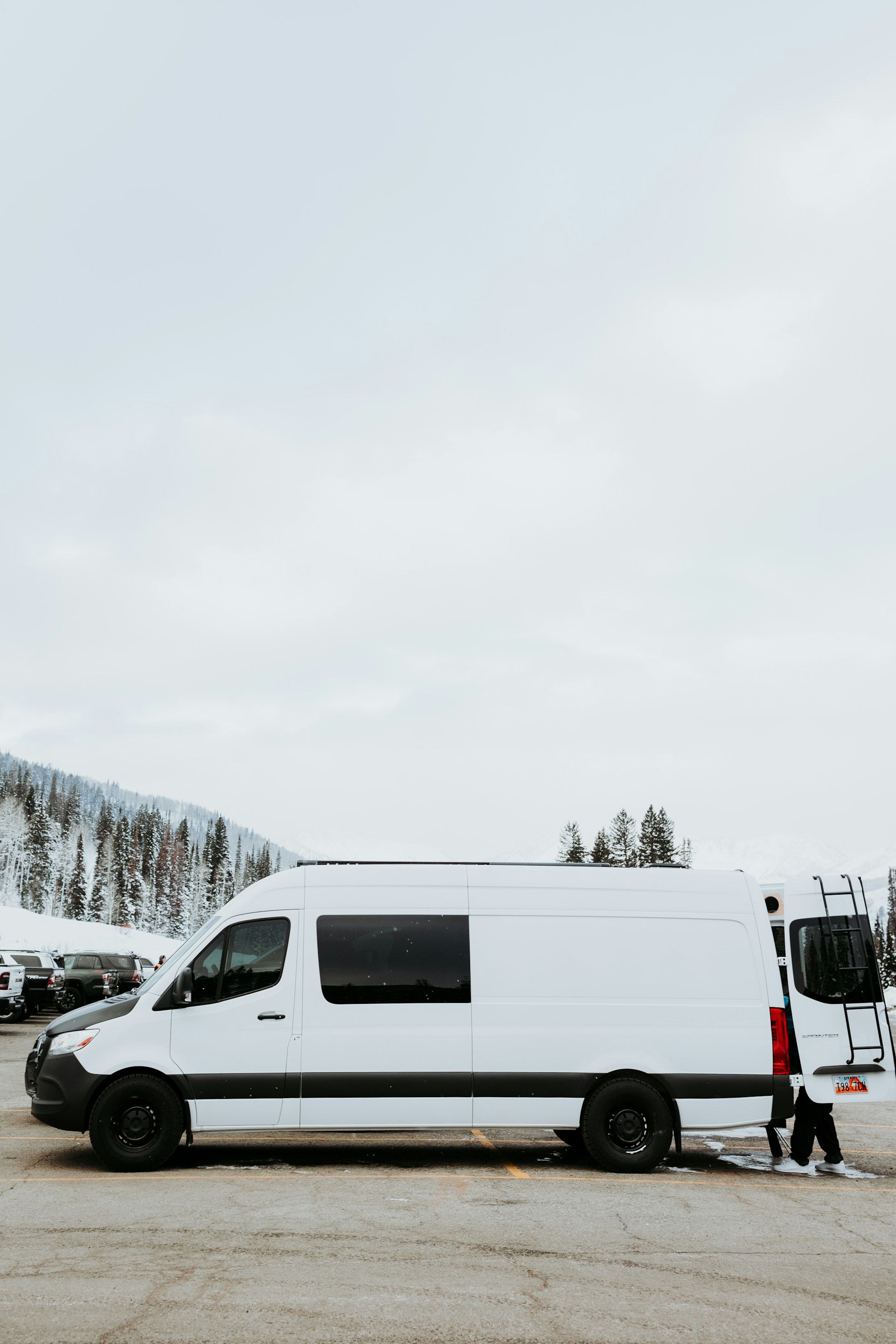 a white van parked in a parking lot