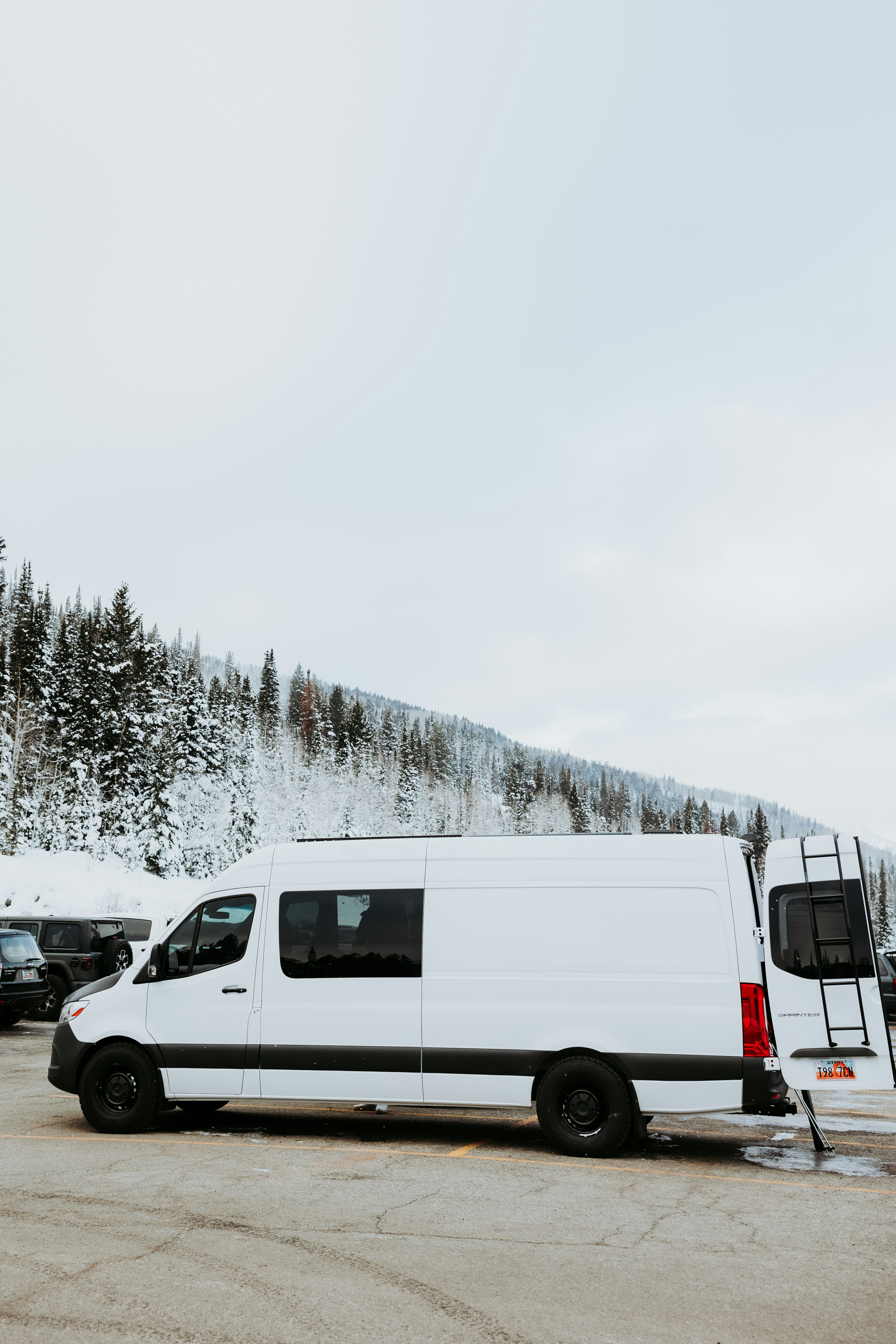 a white van parked in a parking lot