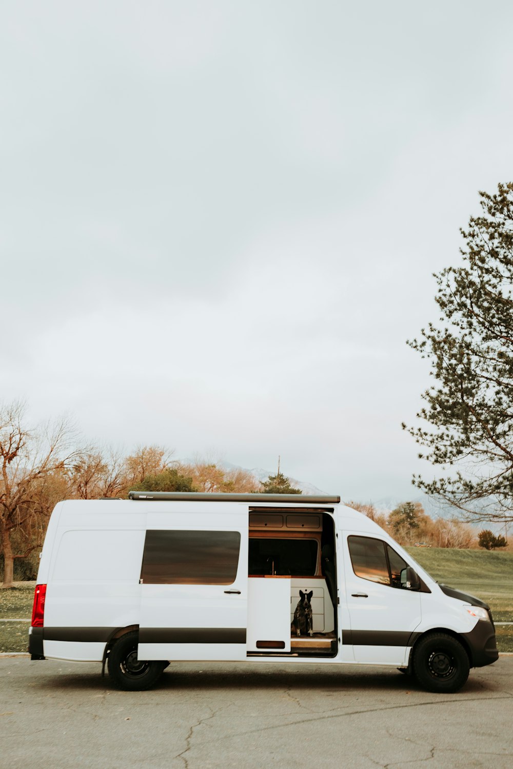 a white van parked in a parking lot