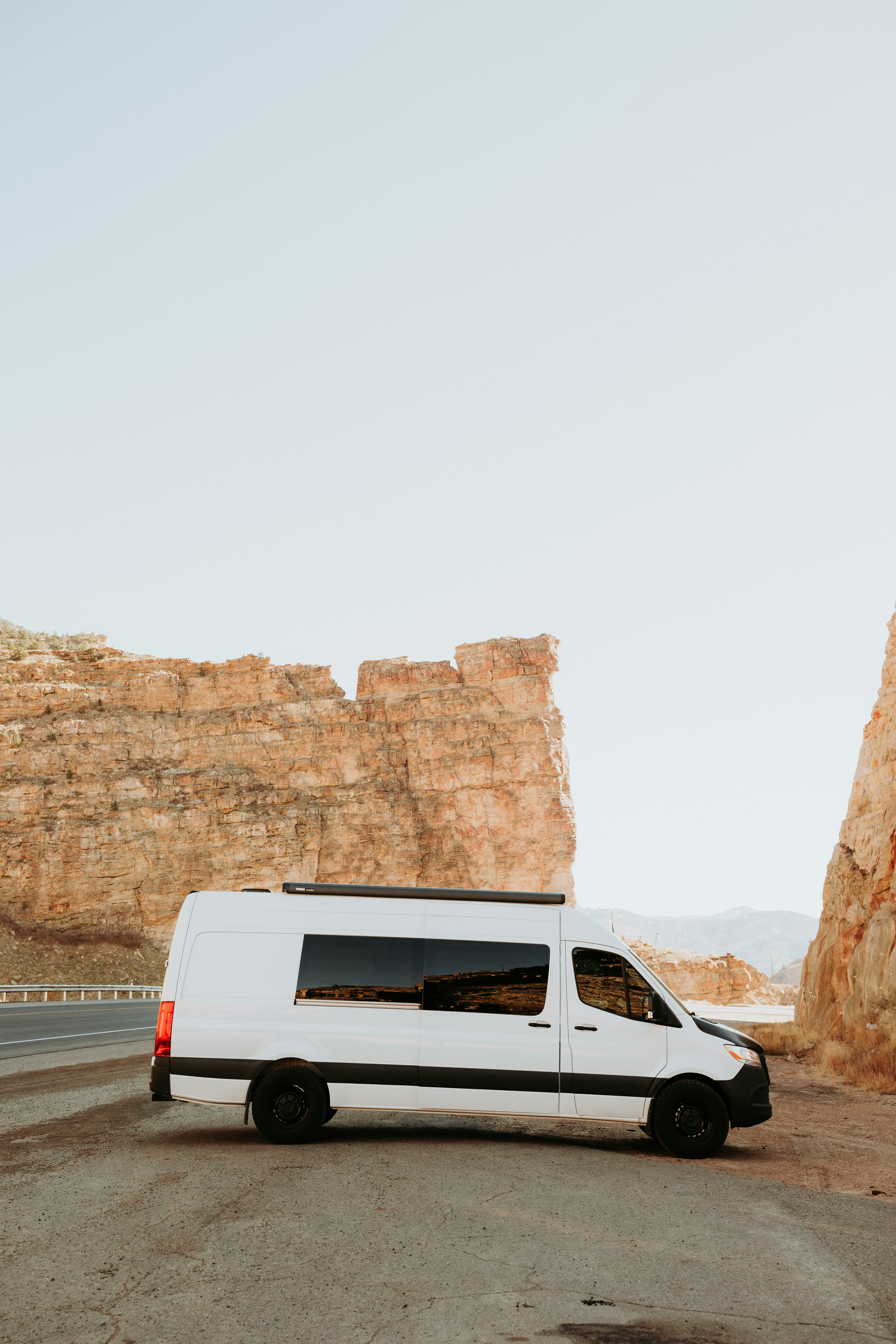 a white van parked on the side of the road