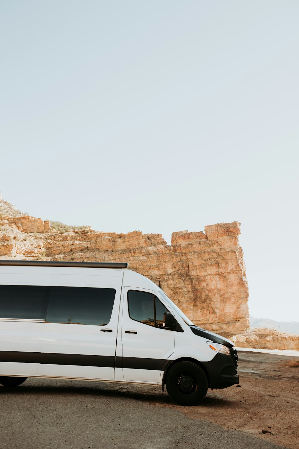 a white van parked on the side of the road