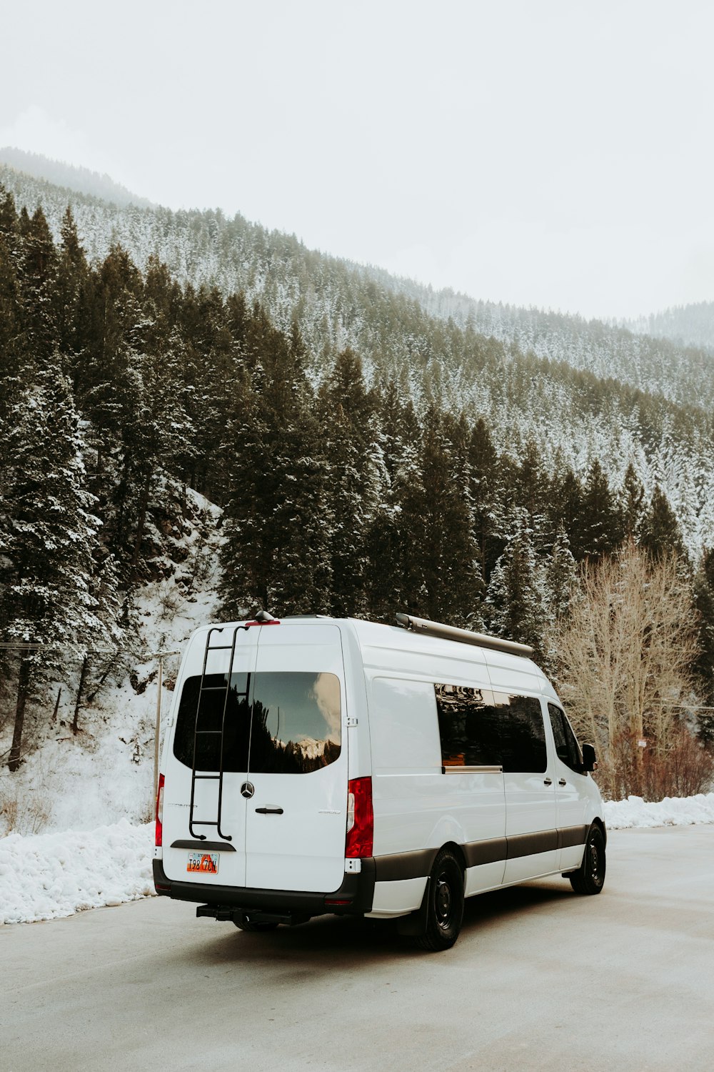 a white van parked on the side of a road