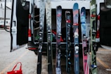a bunch of snowboards are in the back of a van