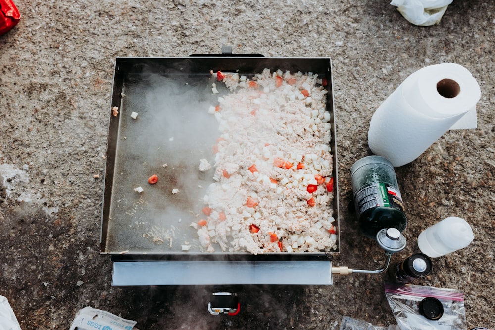 a grill with food cooking on top of it